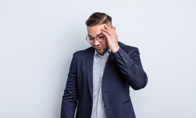 young handsome man feeling bored, frustrated and sleepy after a tiresome. businessman concept