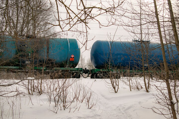 Transportation of liquid bulk cargoes by rail in winter. In perspective. Logistic concept.