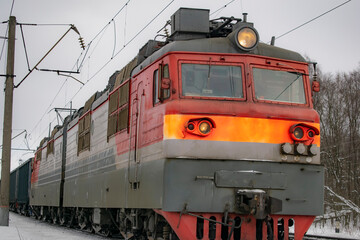 Locomotive of the train in the winter. Transport concept.