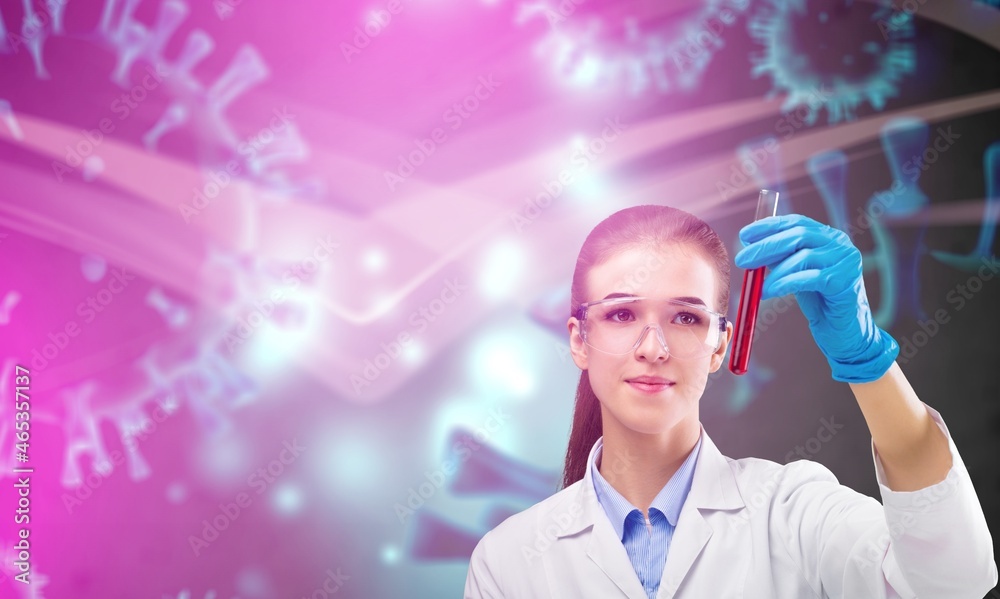 Wall mural Blurred chemist holding a test-tube in futuristic scientific background with infographics.