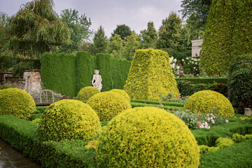 Beautyfull garden. Garden in English and French style. Unique landscape design of the park.