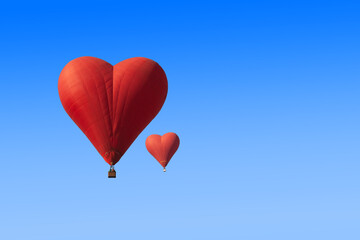 Set of red heart shaped balloon on blue background