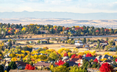 Naklejka premium Colorado Living. Centennial, Colorado - Denver Metro Area Residential Autumn Panorama with the view of a Front Range mountains in the distance