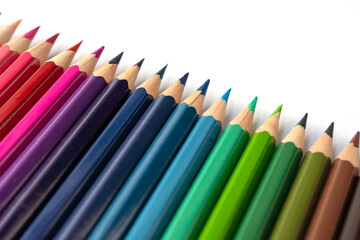 Colorful multicolored pencils on white background. Education, Business and finance concept with copy space. Art