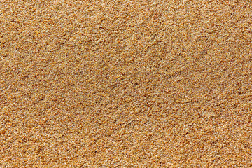 Fine sea sand. Smooth sandy surface.  Selective focus. Background image