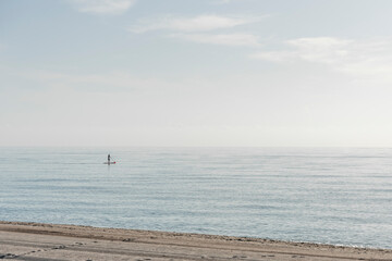 Fototapeta na wymiar Paddleboarder in the ocean