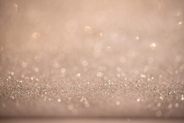 Creative  background of abstract glitter lights. silver and gold. de-focused