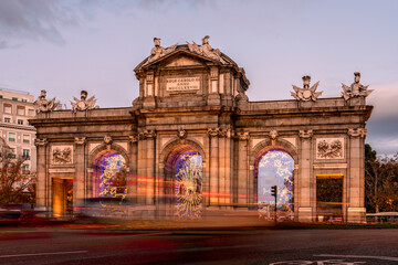 Puerta de Alcala in Madrid at sunset during Christmas © jjfarq