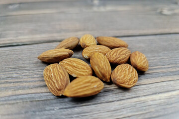 The Natural almond nut close-up. Peeled almonds and nuts.