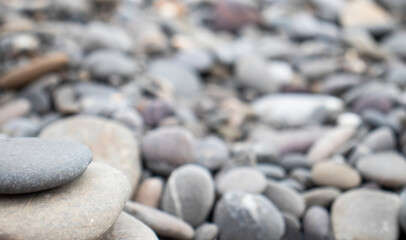 Fototapeta na wymiar cairn of stones by the sea