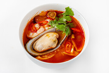 Bouillabaisse. Traditional French fish soup. Top view on white background.