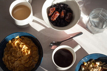 Delicious breakfast: dates, dry breakfast, coffee, oatmeal.