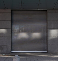 closed shop roller, photo of overhead door in the urban city.