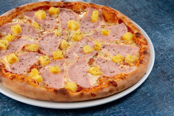fresh pizza on the white plate
