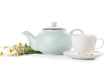 Obraz na płótnie Canvas Teapot and cup of fresh chamomile tea with flowers on white background