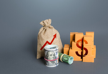 Dollar money with goods and an arrow up. Growing profits. Increasing consumption, trade balance. High sales. Economy growth. Production rise. Import export. Increase in budget revenues from taxes.