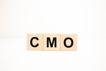 cmo concept on wooden cubes. Business concept