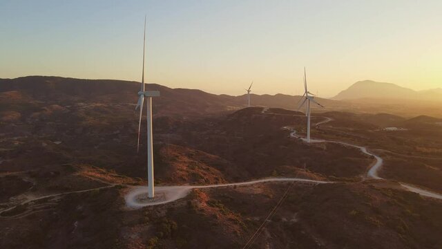 Carbon neutral and Renewable Energy wind farm Wind Turbines. Green and renewable power concept