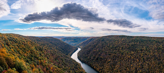 Coopers Rock state park overlook over the Cheat River in narrow wooded gorge in the autumn. Park is...