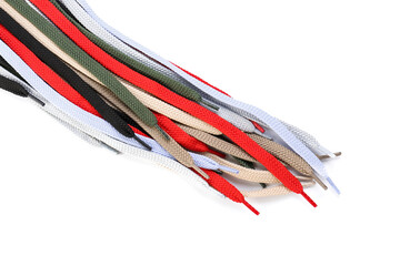 Many shoe laces on white background