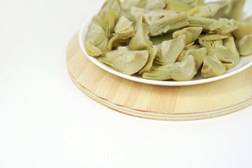delicious plate of Artichokes with white background for vegan diet 