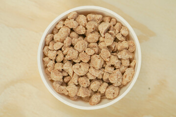 Closeup of textured soy protein. Textured vegetable protein.
Soy meat for a vegan diet