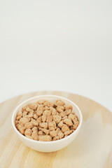 Closeup of textured soy protein. Textured vegetable protein.
Soy meat for a vegan diet