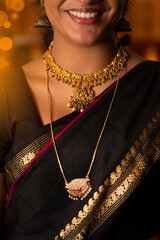 Beautiful gold necklace on neck 