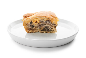 Plate with piece of tasty mushroom pot pie on white background