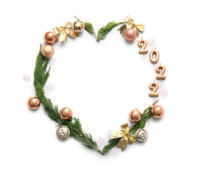 Heart made of coniferous branches, Christmas decorations and figure 2022 on white background