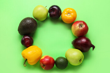 Frame made of different vegetables and fruits on color background. Vegan Day