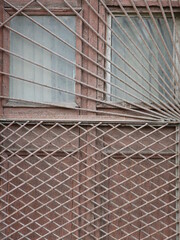 old window with grill