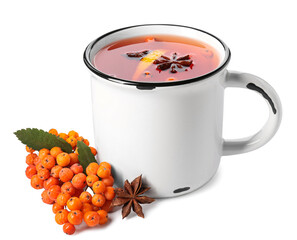 Cup of tasty rowan tea and berries on white background