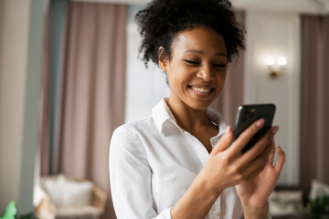 A woman pays for an online order in the app. Shopping in the online store. The hostess of the house surf the Internet.  The student is chatting with friends.