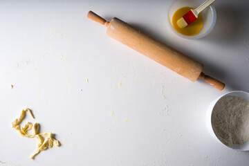 top view kitchen worktop with rolling pin and flour