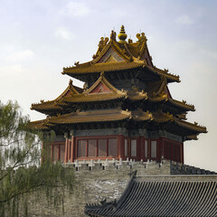 Naklejka premium chinese pagoda during a sunny day with a tree next to it