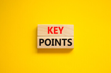 Time to key points symbol. Concept words Key points on wooden blocks on a beautiful yellow background. Business and time to key points concept. Copy space.