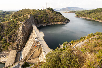 Aerial view of the Embalse de Barcena, a gravity dam in the El Bierzo region