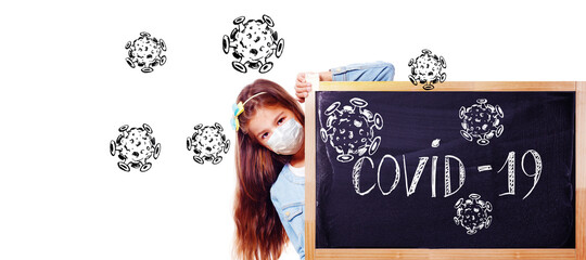 Young girl with protection mask against corona virus at school.