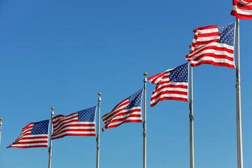 USA Flags at the Washington Monument blowing in the wind
