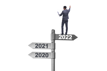 Businessman on the signpost from 2021 to 2022