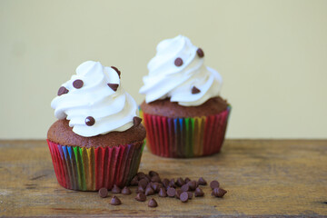 birthday cupcakes on wooden table