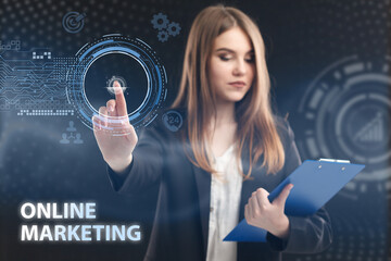 Business, Technology, Internet and network concept. Young businessman working on a virtual screen of the future and sees the inscription: Online marketing