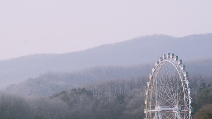 Everland ferris wheel and mountain in Korea.