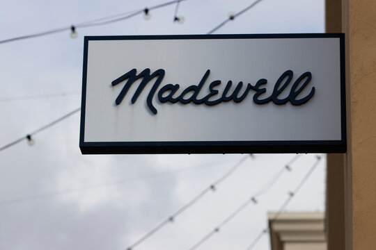 Tigard, OR, USA - Oct 6, 2021: Closeup of the Madewell sign outside one of its retail stores in Tigard, Oregon. Madewell stores are owned by the New York-based J. Crew Group.