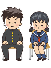 学校の椅子に座る高校生
