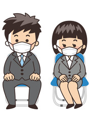 パイプ椅子に座るフレッシュマン　面接　マスク着用