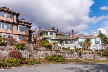 A perfect neighbourhood. Houses in suburb at Summer in the north America. Luxury houses with nice landscape.