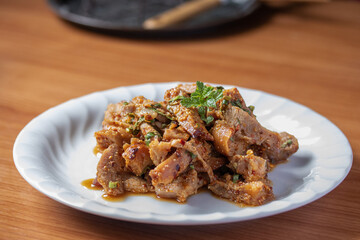 Spicy Grilled Pork Neck Larb, a popular Thai dish