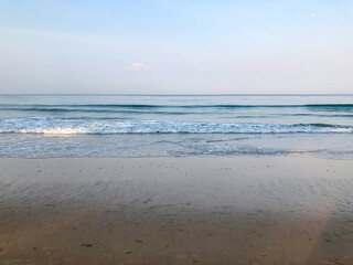 beach, palm trees and Andaman sea in Thailand on Phuket island
